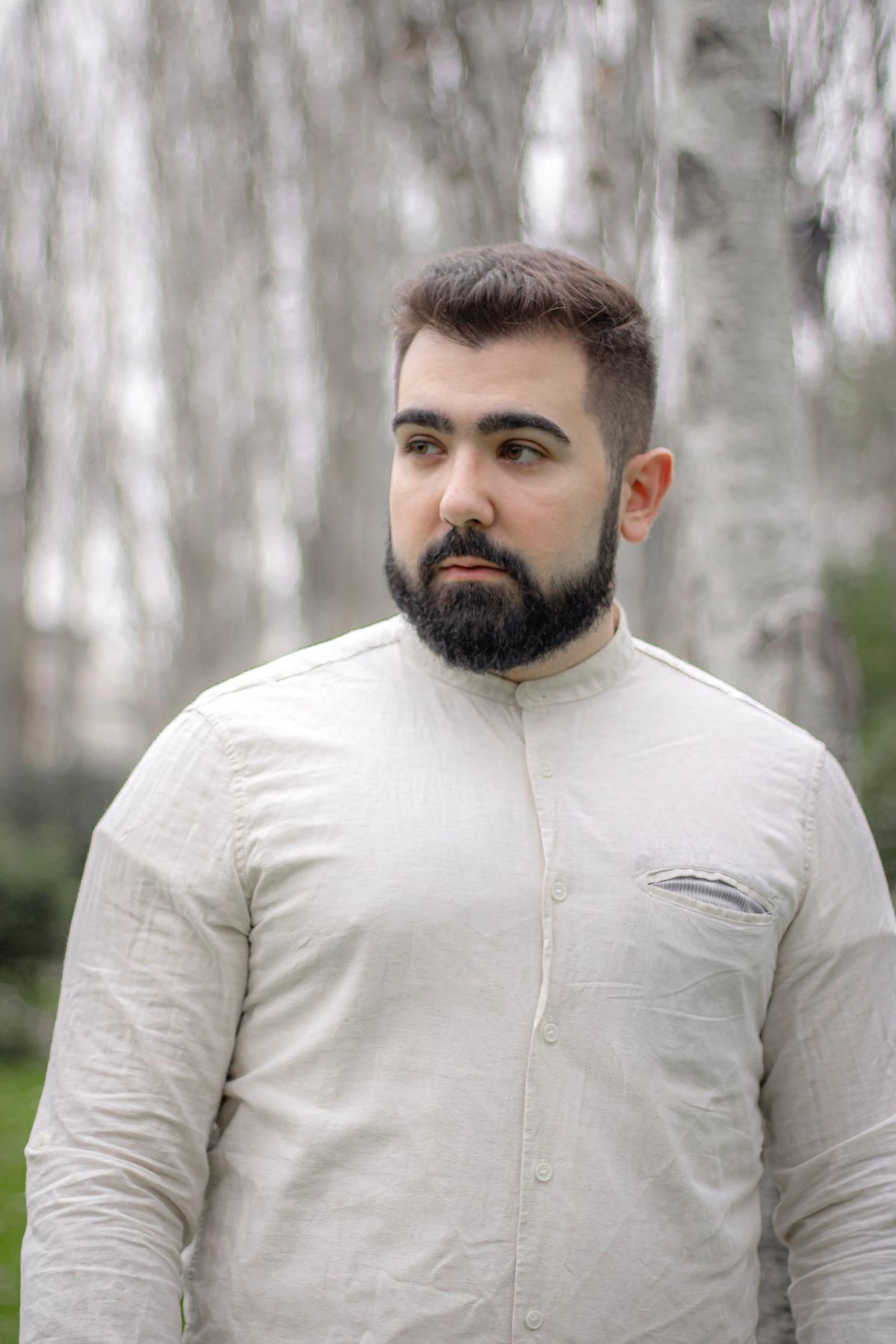 A light linen shirt with a short stand collar.